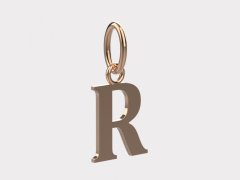 Zlatý přívěsek písmeno R